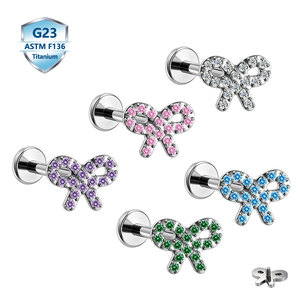 Vente en gros de bijoux de piercing corporel mignons en Titane ASTM F136, clou à lèvre en forme de nœud papillon avec zircon, <span class=keywords><strong>tige</strong></span> à dos plat à filetage interne - Product Image 1