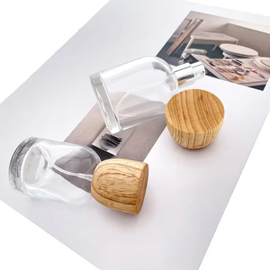 Bouteilles de parfum en verre rondes de luxe de 30ml 50ml 100ml avec bouchon en bois et joint à vis pour sérums de soins de la peau et utilisation de flacon compte-gouttes - Product Image 4