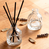 Bouteille en verre de diffuseur de parfum à l'huile essentielle transparente personnalisée de 100ml Bouteille de diffuseur de roseaux décorative de luxe unique avec boîte