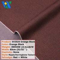 Tela vaquera selvedge de 10.6oz, ligera, con textura especial de espiga ondulada, color naranja gris, tejido de sarga teñido con hilo para jeans.