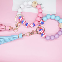 USA Drapeau Bois Perle Bracelet Bracelet Élastique Bracelet Porte-clés Jour de l'Indépendance USA Drapeau Cuir Gland Alliage Porte-clés Porte-clés