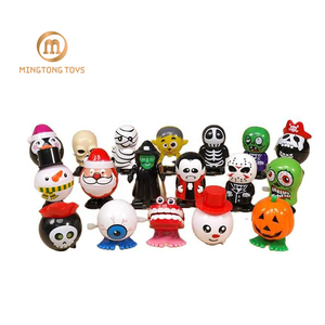 Plástico clásico Mini Clockwork Jump Walk Rotating Tooth Ghost Orange Pumpkin Man Chattering Teeth Prank Halloween Wind Up Toy - Product Image 1