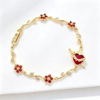 Bracelet en laiton plaqué or réglable avec zircon rouge en forme de cœur traversé d'une flèche, bijou de main de luxe pour femme, cadeau tendance - Grande Vente