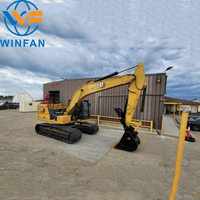 Excavatrice sur chenilles Caterpillar 323GC d'occasion de taille moyenne avec cabine d'origine