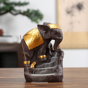 Nuevo quemador de incienso creativo transfronterizo con diseño de elefante dorado y madera de sándalo púrpura para aromaterapia y decoración del hogar. - Product Image 2