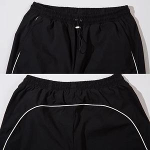 <span class=keywords><strong>Pantalon</strong></span> de <span class=keywords><strong>jogging</strong></span> en nylon léger et personnalisable pour homme, coupe droite, style urbain, avec grandes poches, idéal pour le sport et le travail - Product Image 3