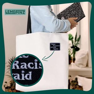 Parche bordado termoadhesivo de 3 pulgadas con la inscripción 'Hace temiedo a los racistas' para sombreros, ropa y mochilas - Product Image 3
