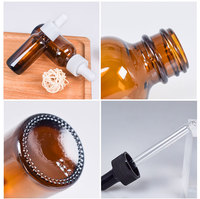 Wadah kosong botol Amber kaca minyak esensial bulat Boston 30mL 2Oz penetes kaca untuk cairan farmasi
