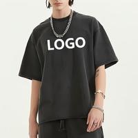 T-shirt en coton noir surdimensionné pour homme avec logo blanc imprimé, manches courtes, col rond, coupe décontractée