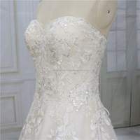 Robe de mariée moderne de luxe coupe trapèze longue, sans bretelles, élégante, avec appliques, à lacets et sequins, vente en gros