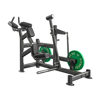 Machine à pédales pour fessiers 100 kg, à pédales pendulaires, pour extensions de hanche à genoux, avec positionnement réglable du pied, à charge par plaques, usage commercial en salle de sport