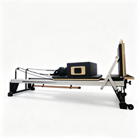 Machine de Pilates Reformer blanche et noire avec logo personnalisé, avec ressorts, pour kit de Pilates et équipement de gym