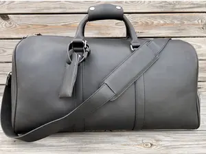 El yapımı özel Logo deri silindir çanta erkek gecede taşımak hafta sonu spor salonu seyahat çantası toptan deri spor çantası