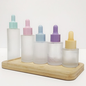 ขวดแก้วใส่เครื่องสำอางสีดำขนาด 30 กรัม แบบกำหนดเองจากโรงงาน สำหรับบรรจุเซรั่มน้ำมันบำรุงเส้นผม ขวดแก้วแบบไหล่เรียบสีด้านพร้อมหัวหยด - Product Image 5