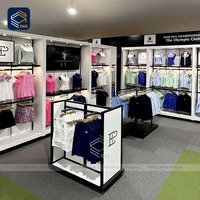 Présentoir à vêtements personnalisé pour vente au détail Casquettes et chemises Mobilier de boutique élégant Magasin de vêtements Design d'intérieur Présentoirs à vêtements