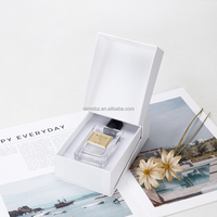 Bouteille de parfum personnalisé huile essentielle 50ml emballage en papier de luxe pour cosmétiques avec doublure éponge nouveau couvercle de boîte cadeau