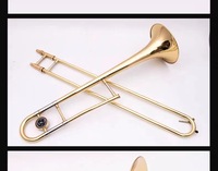 A Brass Lacquered Gold Trombone Instrument with case in the Flat B Tone of the Baritone