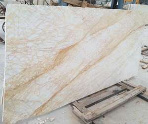 Vente en gros de placage de marbre araignée doré naturel fin et léger pour matériaux de revêtement haut de gamme - Product Image 1