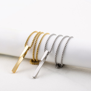 Collar con colgante geométrico de acero titanio estilo europeo americano, cadena larga para suéter, unisex, color dorado y acero. - Product Image 1