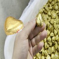 Machine d'emballage de chocolat en forme de cœur avec film métallisé, distribution de colle haute vitesse, entièrement automatique et personnalisable