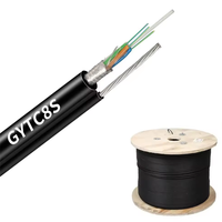 Câble à fibres optiques blindé GYTC8 en forme de 8, double gaine, gaine PE noire, extérieur