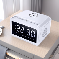 Desktop digitale wekker met speaker, draadloos opladen voor V5.3, 10-30W uitgangsvermogen, kleurrijk LED-licht en FM-radio speaker.