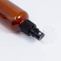 Bouteille en plastique ronde transparente personnalisable de 100 ml en PET pour spray corporel, nettoyant visage et huile essentielle avec couleur personnalisée