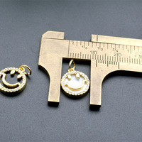 Vente en gros de bijoux accessoires Anti-décoloration plaqué or naturel oeil de tigre Agate creux sourire visage pendentif charmes pour bricolage femmes