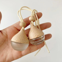 Bouteilles de parfum de voiture rondes en verre, logo personnalisé, pendentif de 5ml, forme ronde, bouteille de diffuseur de voiture vide suspendue