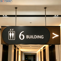 Boîte lumineuse LED personnalisée double face suspendue en acrylique et métal pour signalétique publicitaire et de direction pour aéroports, centres commerciaux et bâtiments