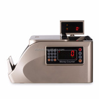 Petit machine à compter ses billets de banque, pour compter l'argent, 690