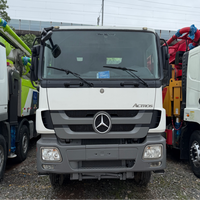 Pompe à béton à flèche Zoomlion 50m d'occasion, bien entretenue et testée, châssis diesel Benz, moteur Euro 5, pour projets de construction