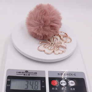 Élégant porte-clés <span class=keywords><strong>papillon</strong></span> en strass de cristal avec pompon duveteux, en métal or rose, pour <span class=keywords><strong>sac</strong></span> à main tendance - Product Image 6
