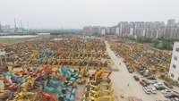 Excavatrice sur pneus Sany SY75W Pro de 7 tonnes d'occasion avec boîte de vitesses et roulement central