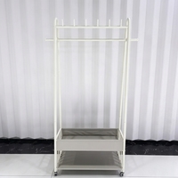 Porte-manteau pliable moderne à double niveau en fer pour magasin, salon, rangement de pantalons et chaussures, gain de place, écologique, durable