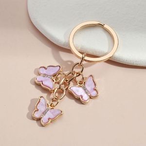 Porte-clés papillon à paillettes et strass Porte-clés mignon Porte-clés animaux en cristal volant avec gouttes d'<span class=keywords><strong>huile</strong></span> Porte-clés pour femmes Accessoires de sac faits à la main - Product Image 5