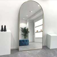 Miroir mural pleine longueur en verre doré avec cadre en aluminium arqué moderne pour la décoration du salon et de la chambre