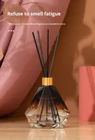 Diffuseur de parfum élégant en verre gris cristal sans alcool de 100 ml, artisanal, avec bâtonnets noirs, huile essentielle de qualité supérieure pour la diffusion