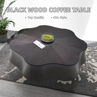 Table basse moderne, simple, de haute qualité, en bois massif noir, avec rangement et fleurs, au design minimaliste, pour salon et maison
