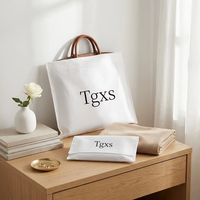 Pochette de luxe en tissu de coton doux avec nœud en ruban, petite pochette à bijoux, pochette textile personnalisée avec logo, prix d'usine
