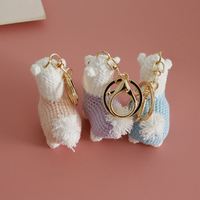 Vente en gros de jouets en crochet amigurumi faits à la main, peluches, jouets en peluche anime, poupées tricotées, alpaca, lama, vache, renard, canard, porte-clés amigurumi