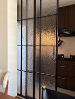 Porte coulissante intérieure en verre cannelé avec cadre noir mat, sur mesure, porte de séparation