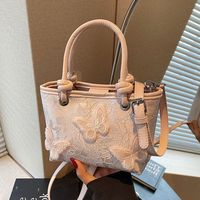 Sac seau polyvalent à bandoulière brodé style chinois, très tendance pour l'été