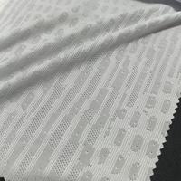 Tissu sportif en maille jacquard blanc en polyester recyclé GRS 100 % Dry Fit pour vêtements de sport respirants