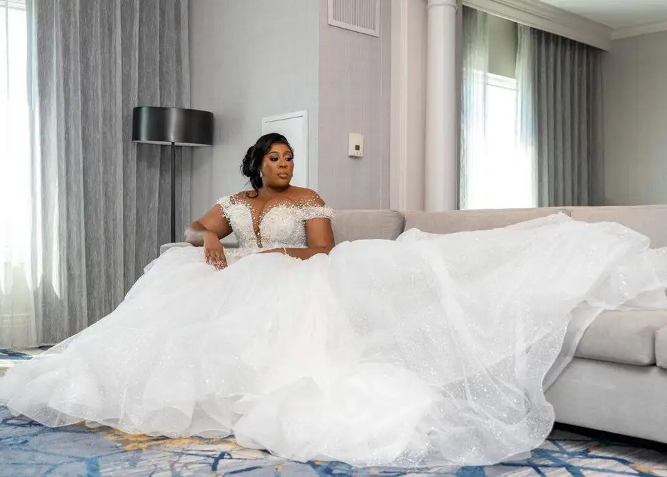 wedding dress with sheer back and pearls The 16 Best Wedding Dresses With Pearl Details