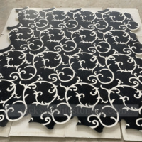 Tuile de motif de pierre de mosaïque de mur de conception de jet d'eau noir de forme de coquille