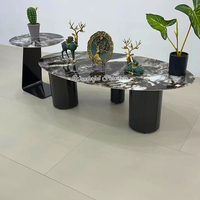 Table basse gigogne au design unique, luxe léger, avec plateau en pierre et pieds en acier inoxydable