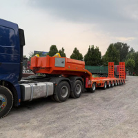 Semi-remorque plateau HYT à 8 essieux pour transport de conteneurs en acier, capacité de charge de 120 tonnes et train de roulement robuste à deux vitesses
