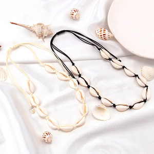 สร้อยคอเชือกถักมือจากเปลือกหอย ยืดหยุ่นได้ สีดำขาว เครื่องประดับสำหรับงานปาร์ตี้ริมชายหาด - Product Image 1