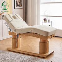 Table de massage électrique réglable Jincheng pour salon de beauté, usage scolaire, hôtelier, sportif, sous-sol et traitement par ventouses